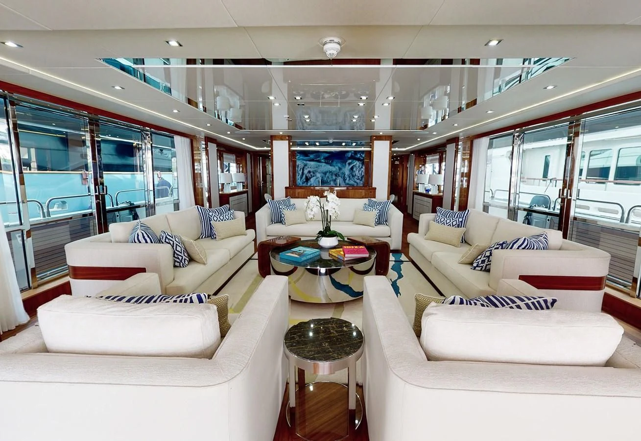 a living room with a couch and a table aboard ANYA Yacht for Sale