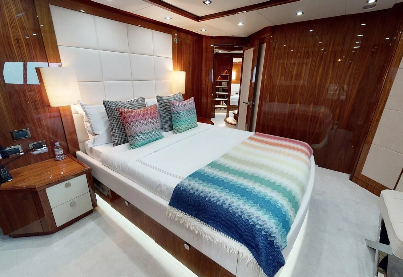 a bed in a room aboard ANYA Yacht for Sale