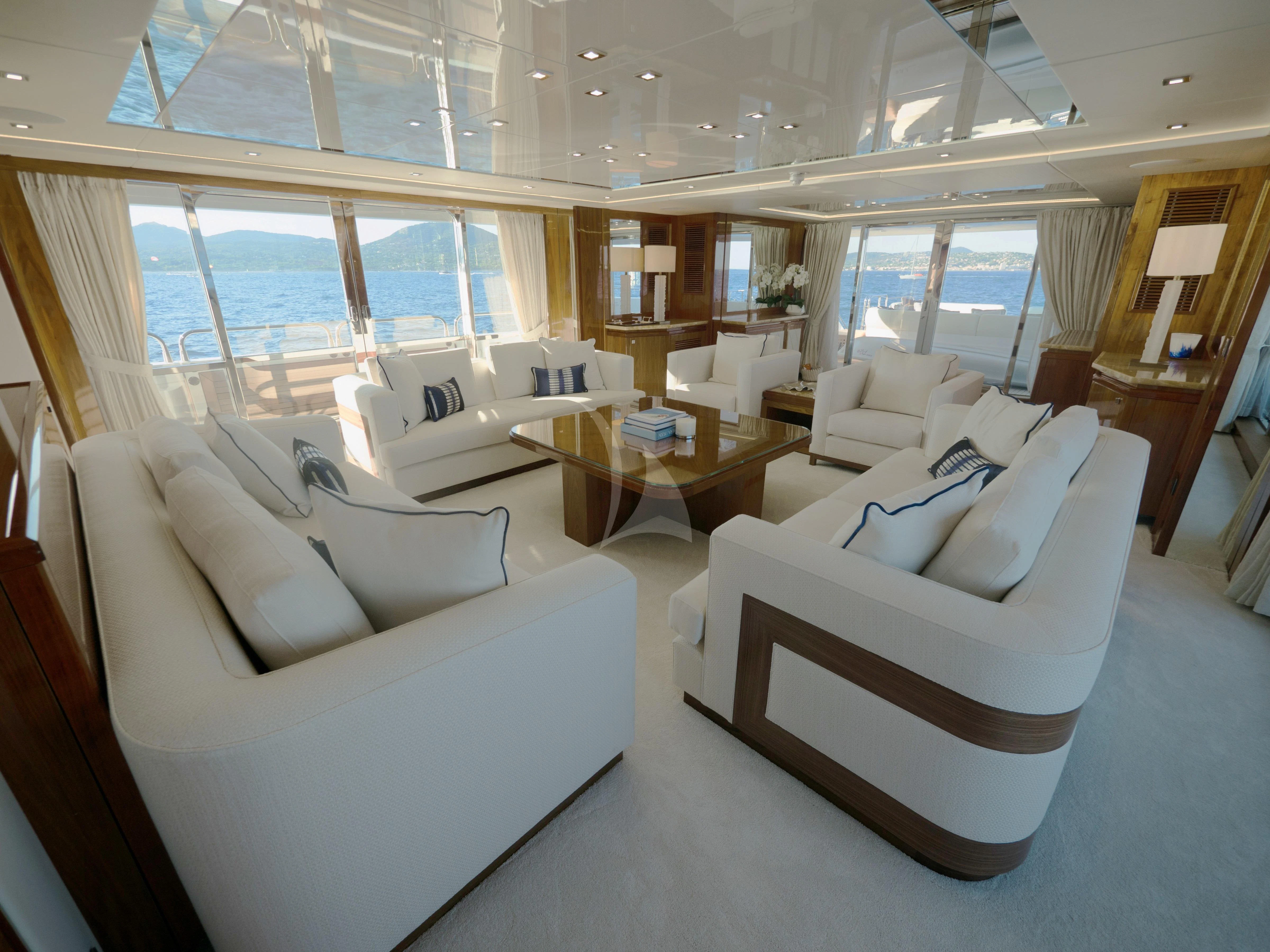 a room with a couch and a table aboard ANYA Yacht for Sale
