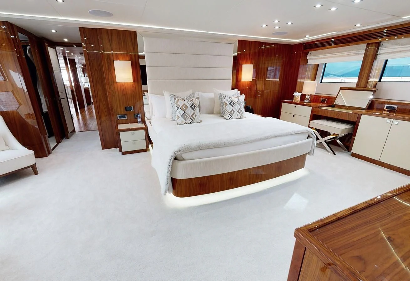 a large bedroom with a bed aboard ANYA Yacht for Sale