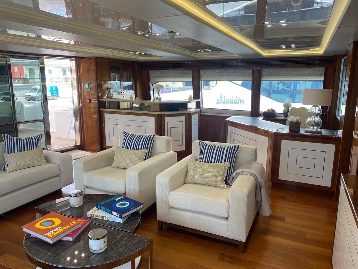 a living room with a couch and a table aboard ANYA Yacht for Sale