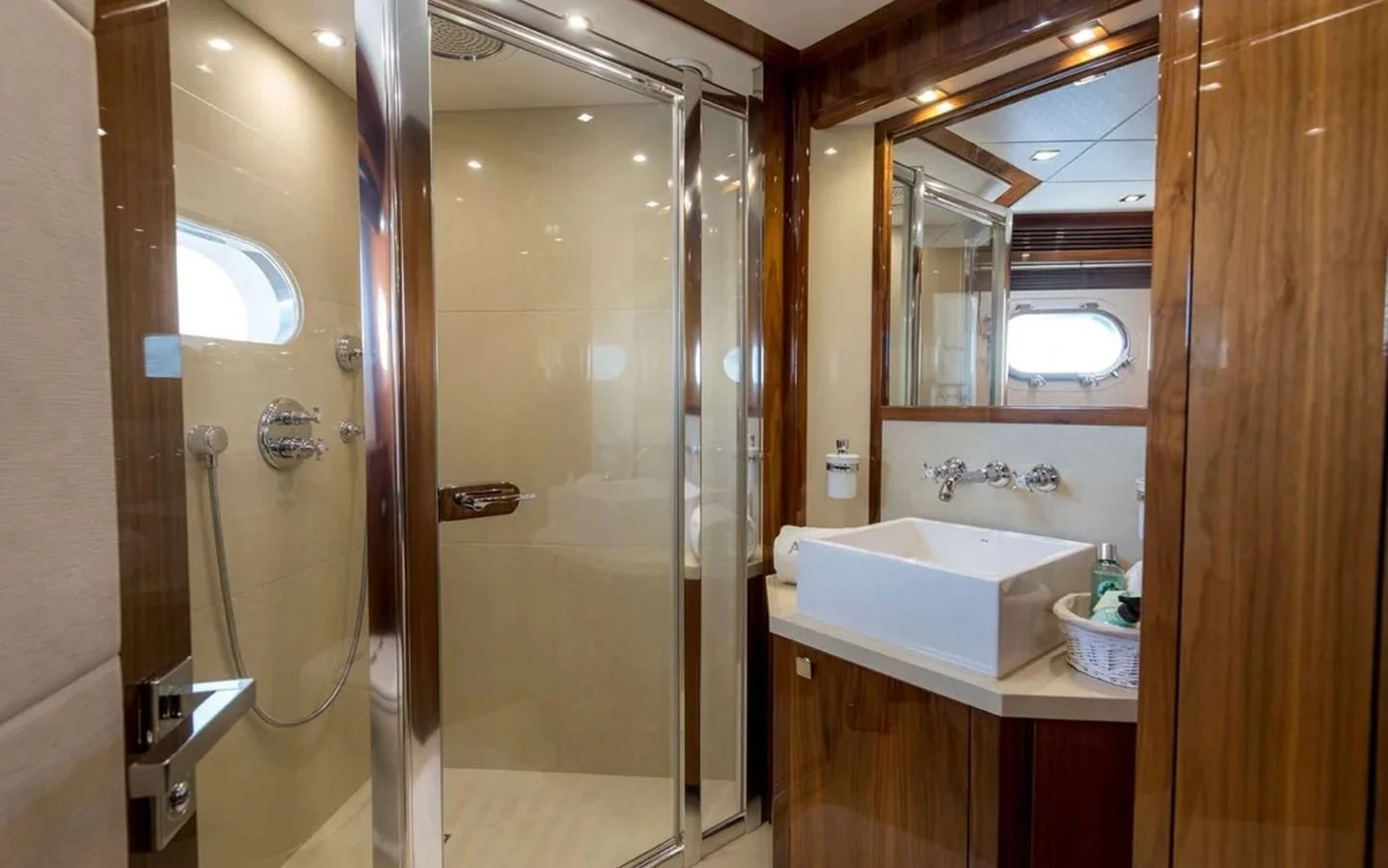 a bathroom with a glass shower aboard ANYA Yacht for Sale