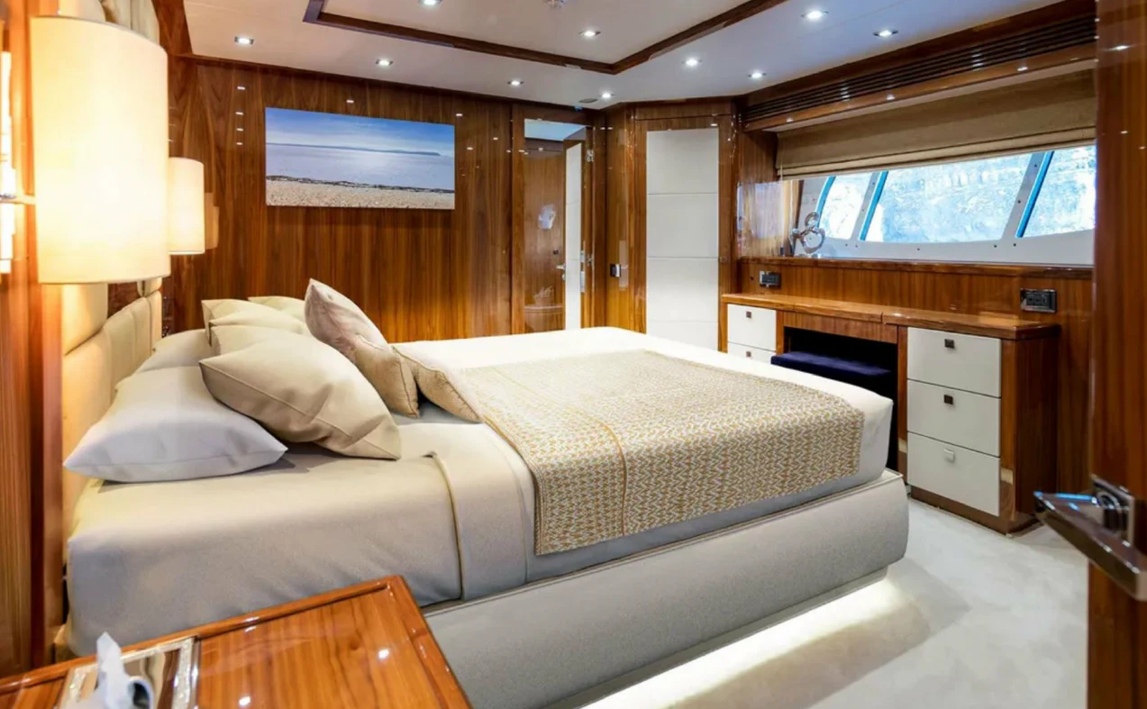 a large bed in a room aboard ANYA Yacht for Sale