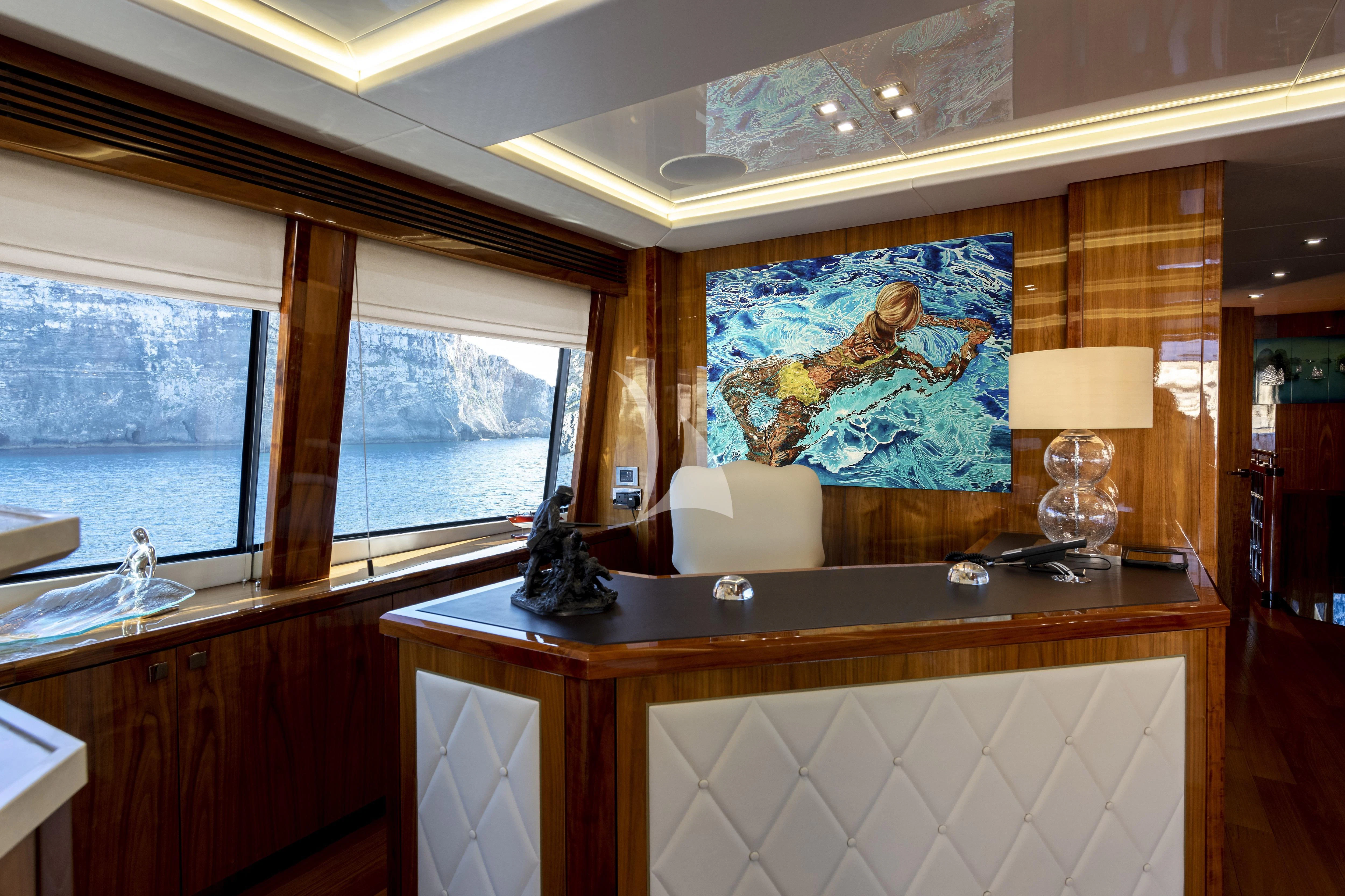a room with a painting on the wall aboard ANYA Yacht for Sale