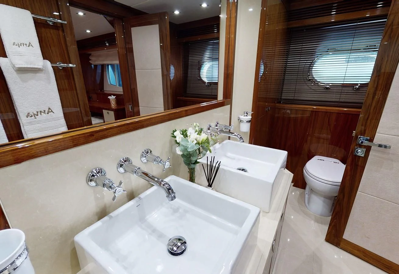 a bathroom with a sink and toilet aboard ANYA Yacht for Sale