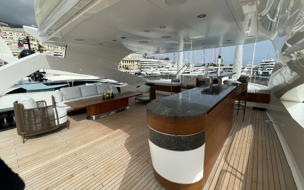 a room with a large table and chairs aboard ANYA Yacht for Sale