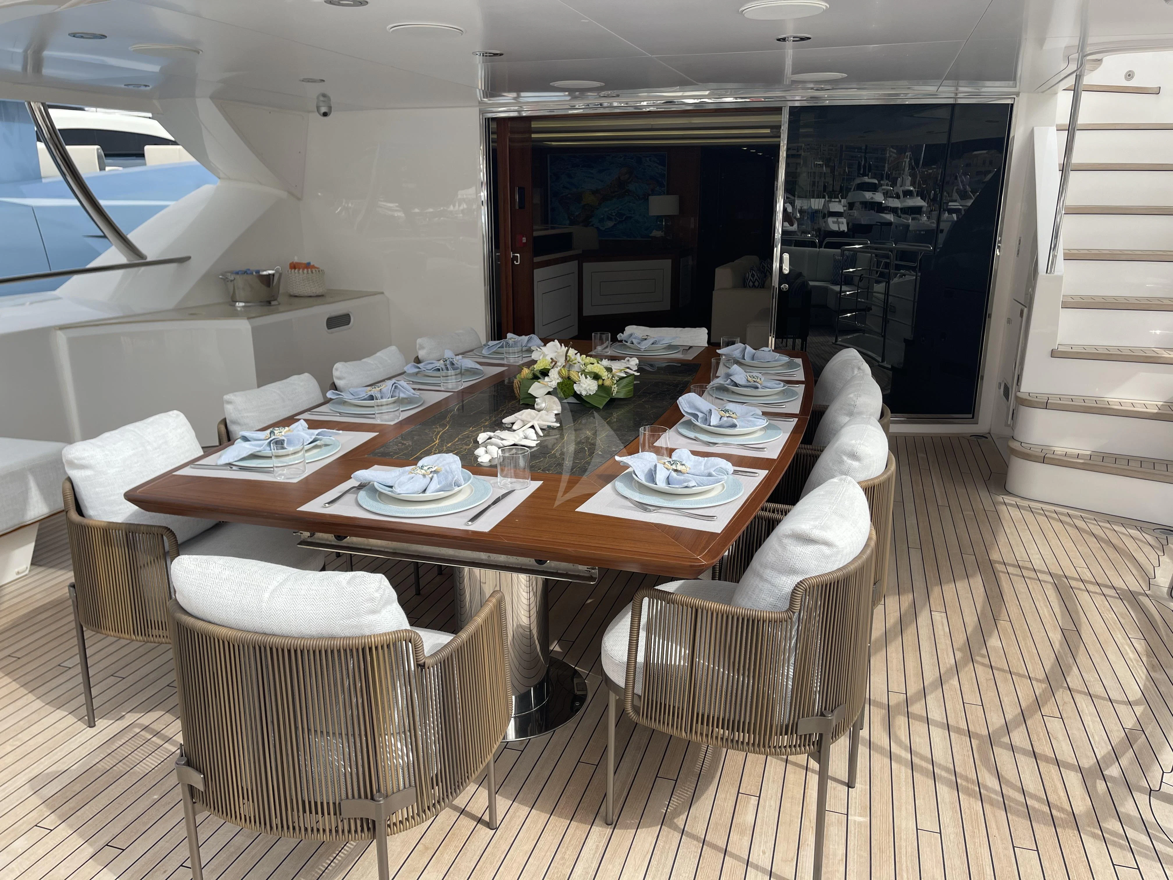 a dining table in a room aboard ANYA Yacht for Sale