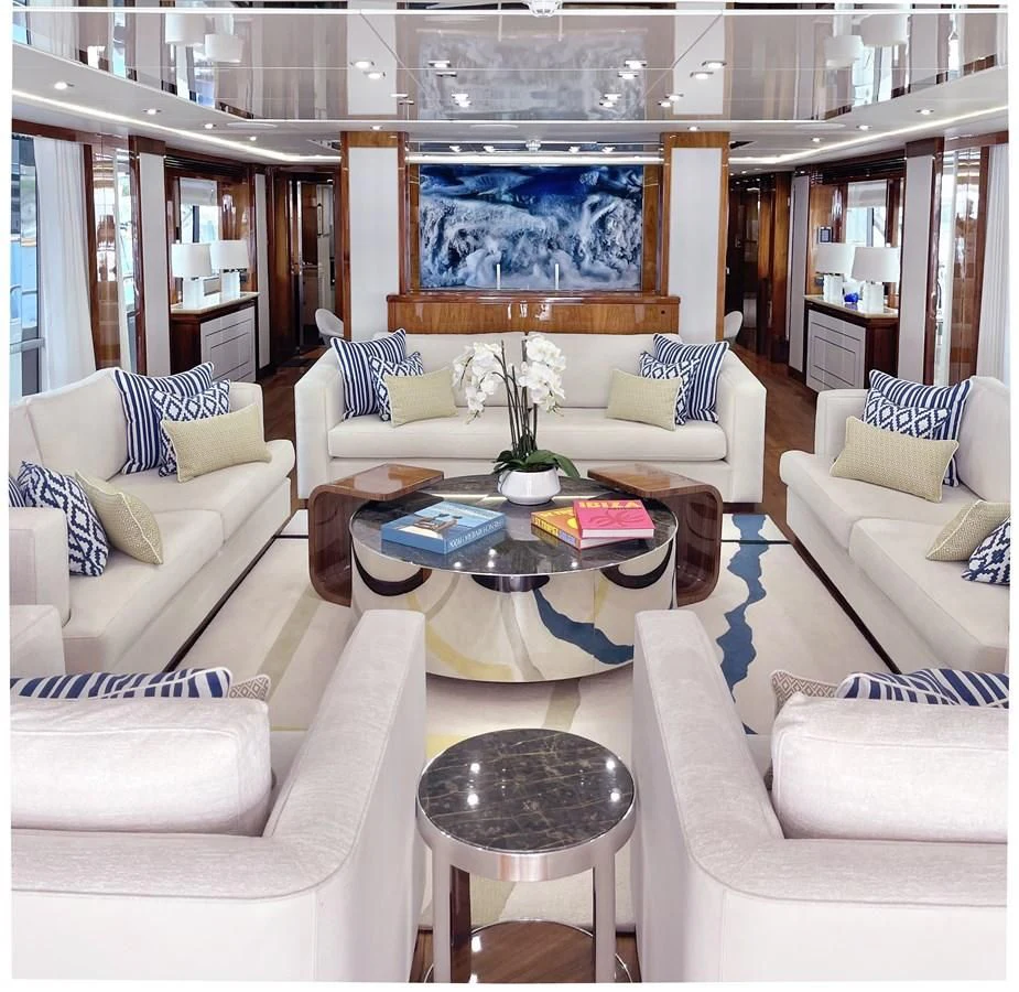 a living room with a couch and a table aboard ANYA Yacht for Sale