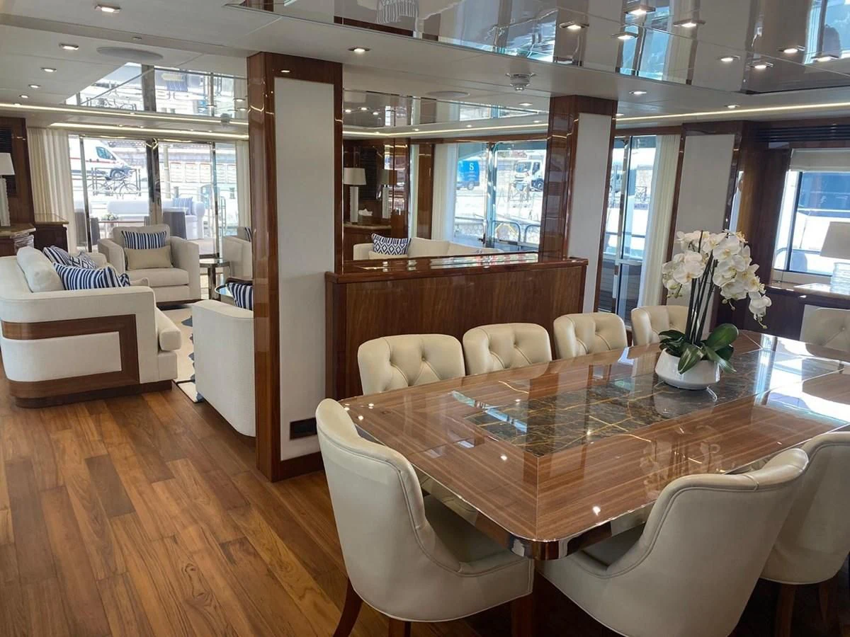 a dining room with a table aboard ANYA Yacht for Sale