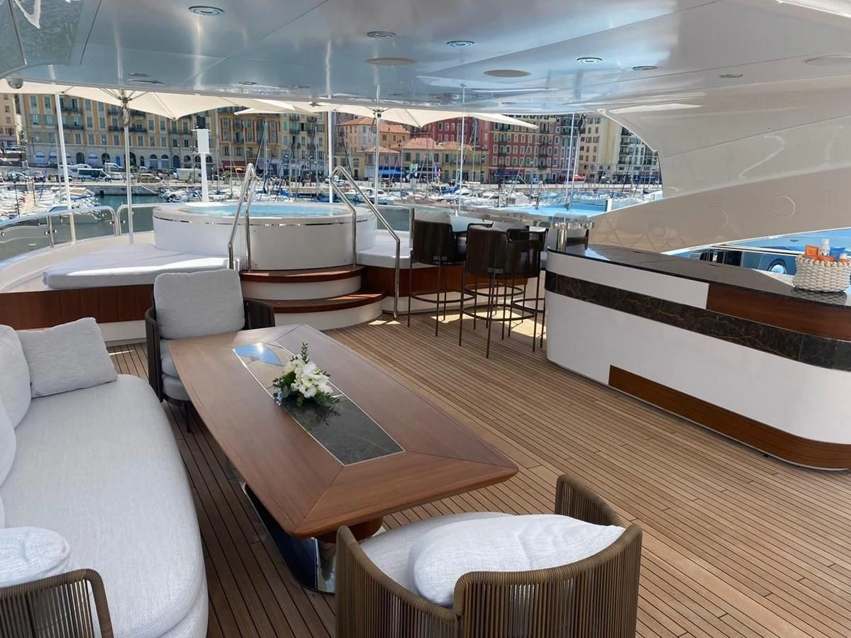 a room with a table and chairs aboard ANYA Yacht for Sale