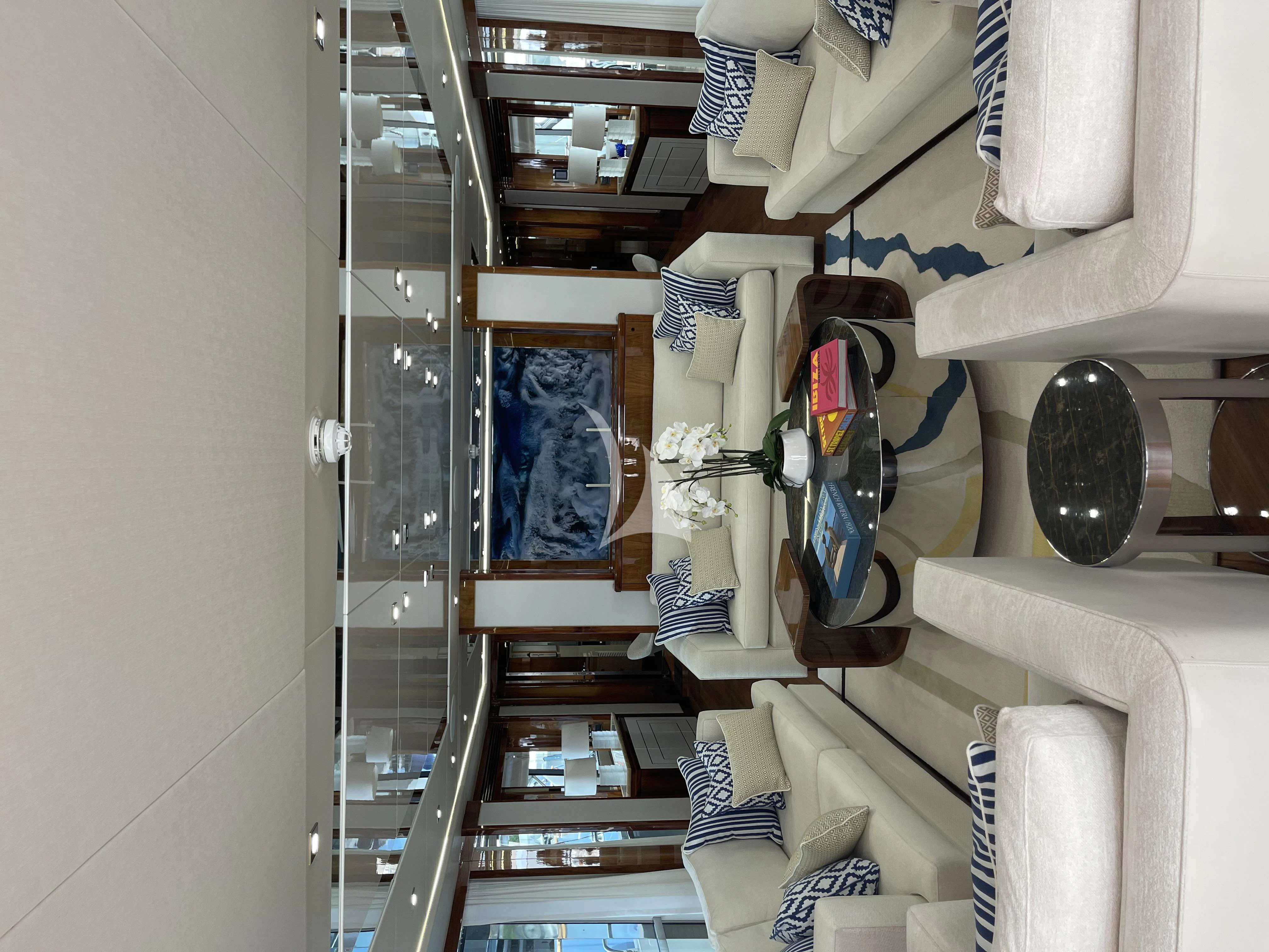 a room with a mirror and a shelf with objects on it aboard ANYA Yacht for Sale