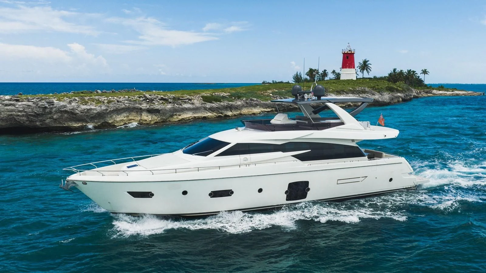 a white boat in the water aboard KUDU Yacht for Sale
