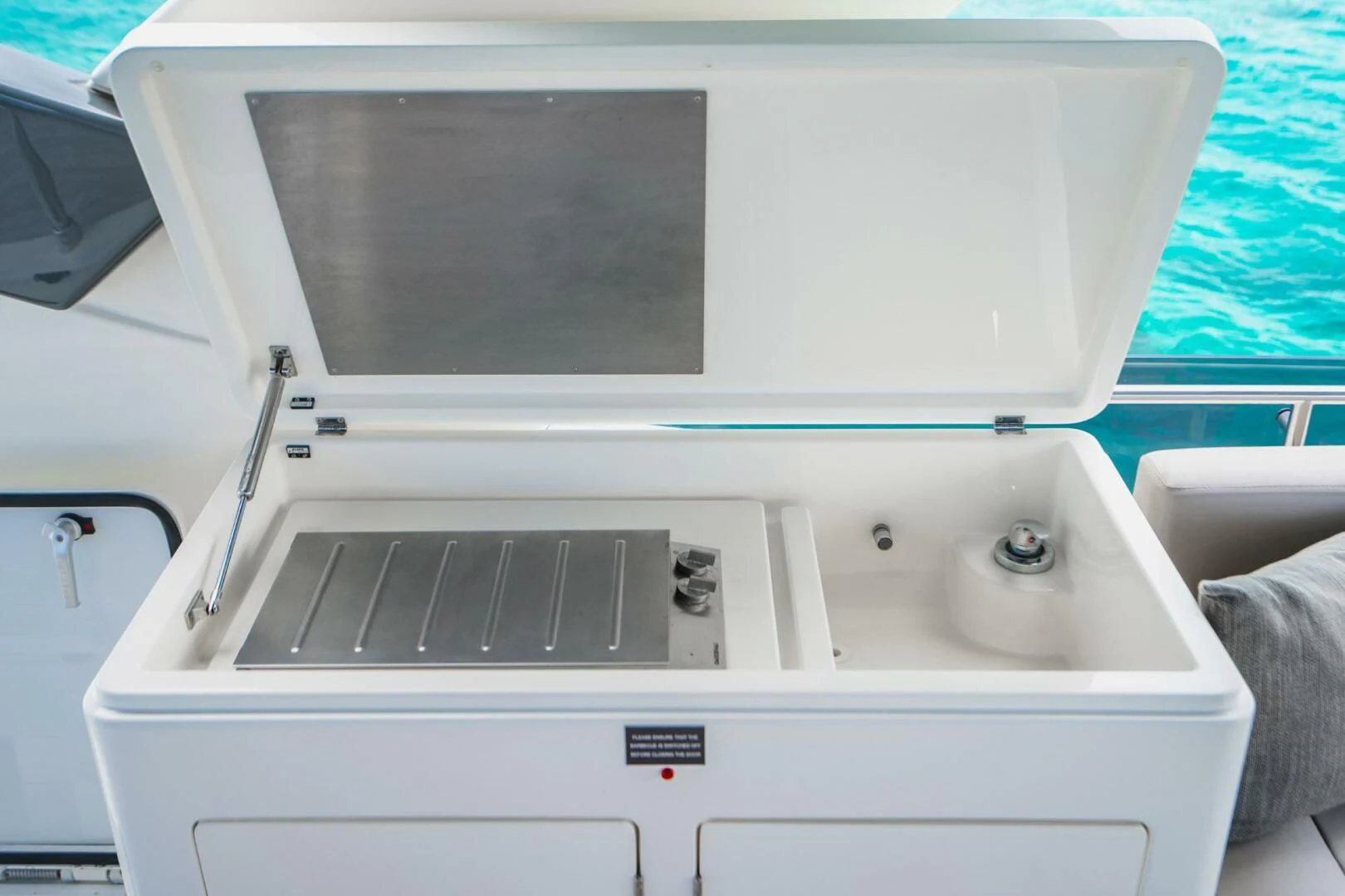 a white rectangular object with a black object on it aboard KUDU Yacht for Sale