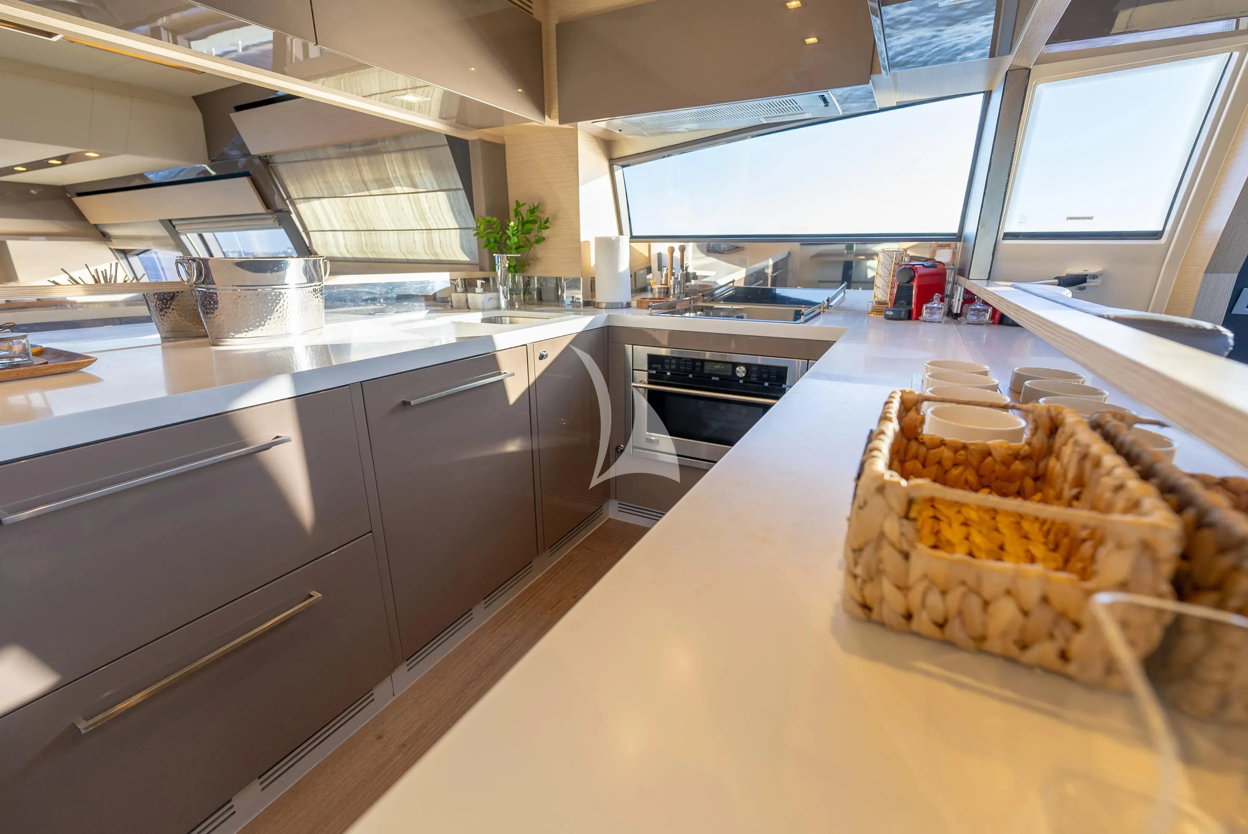 a kitchen with food on the counter aboard KUDU Yacht for Sale
