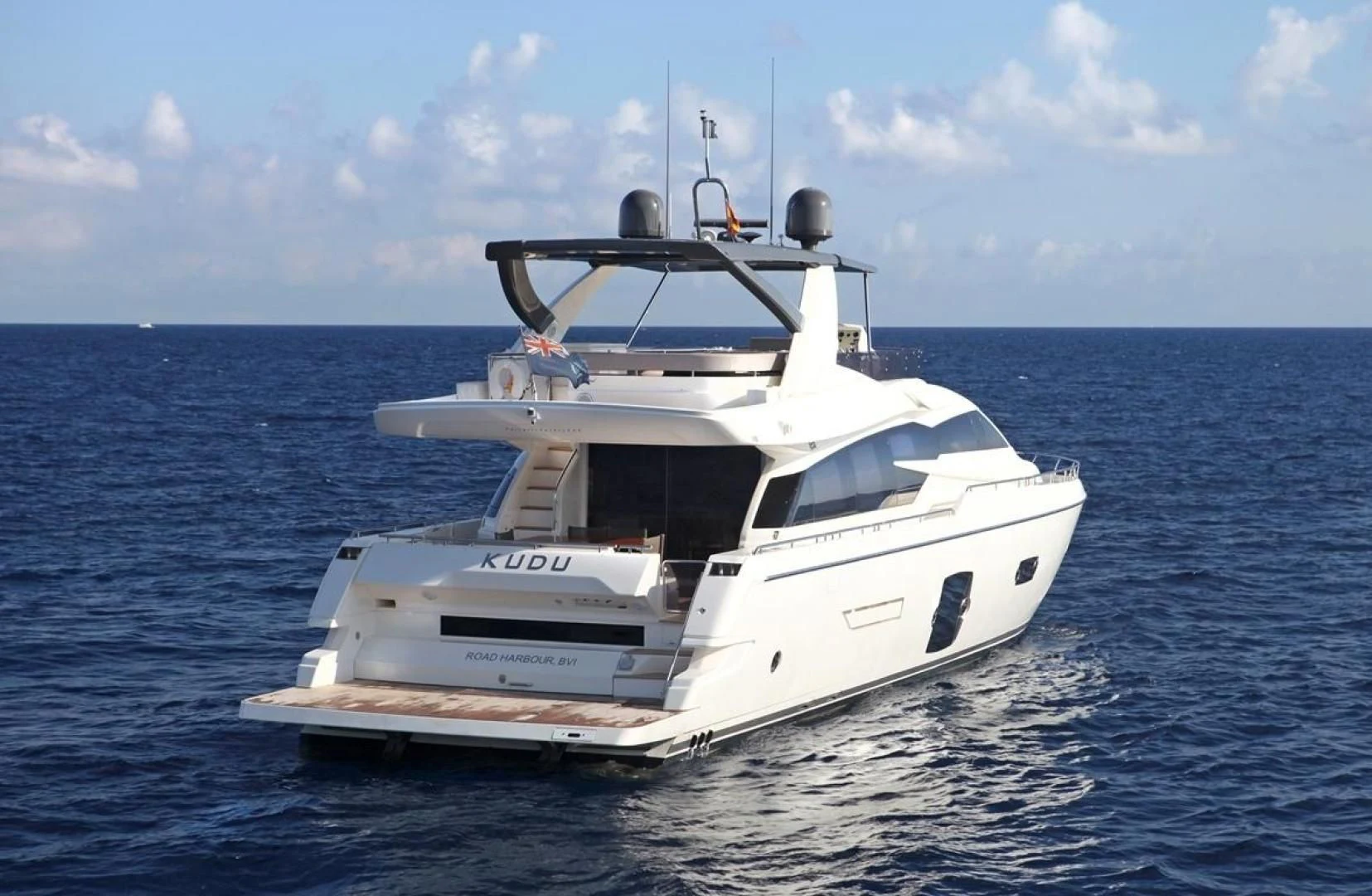 a white boat in the water aboard KUDU Yacht for Sale