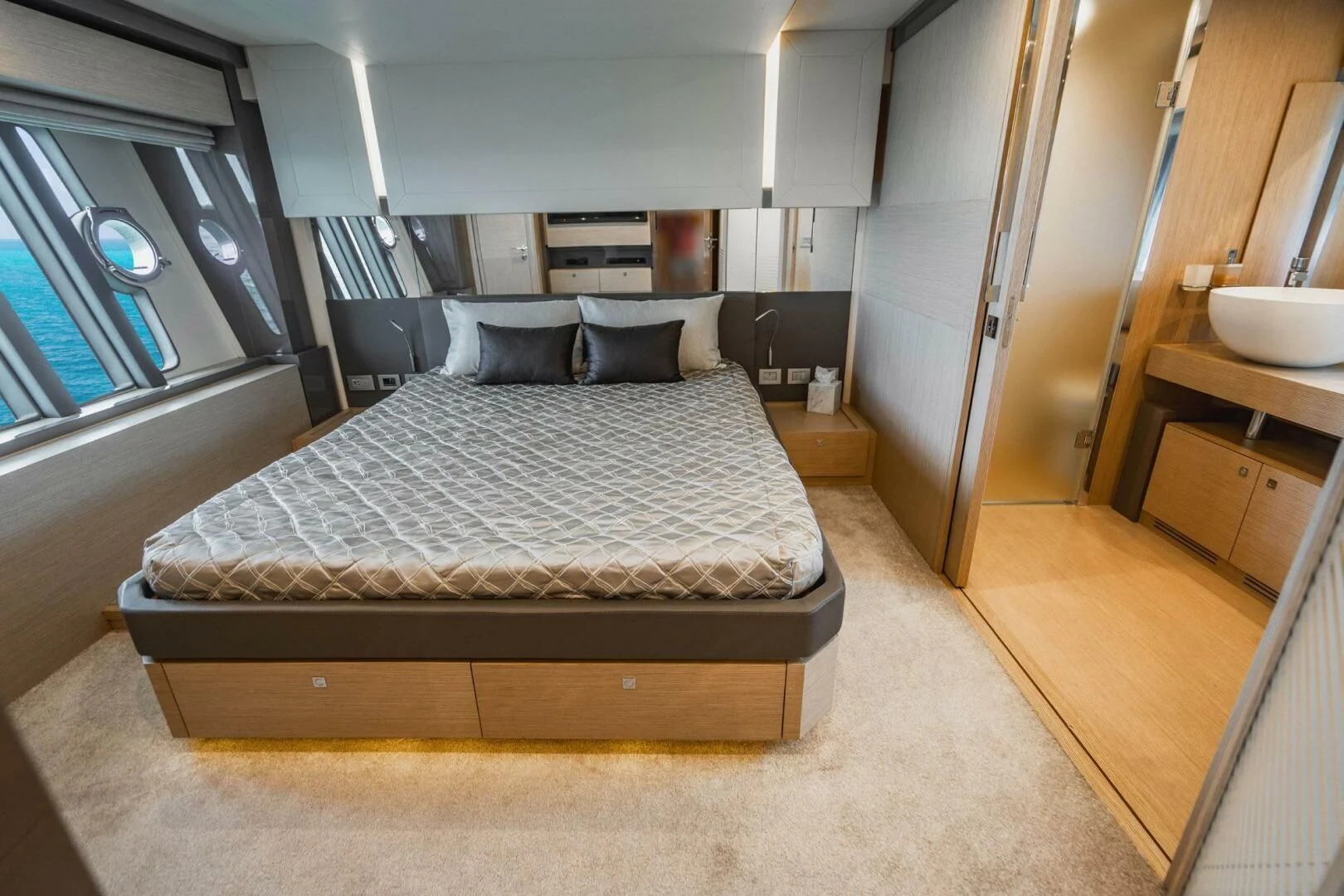a bed in a room aboard KUDU Yacht for Sale