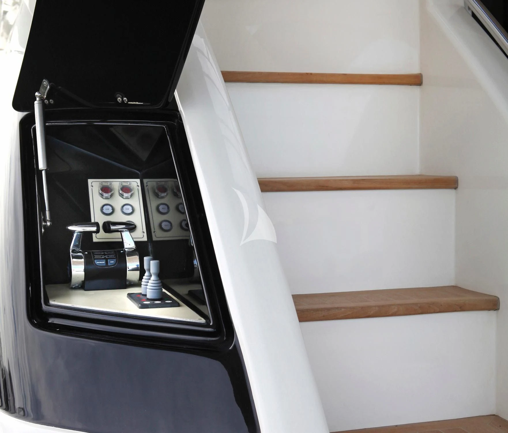 a white box with a black box inside aboard KUDU Yacht for Sale