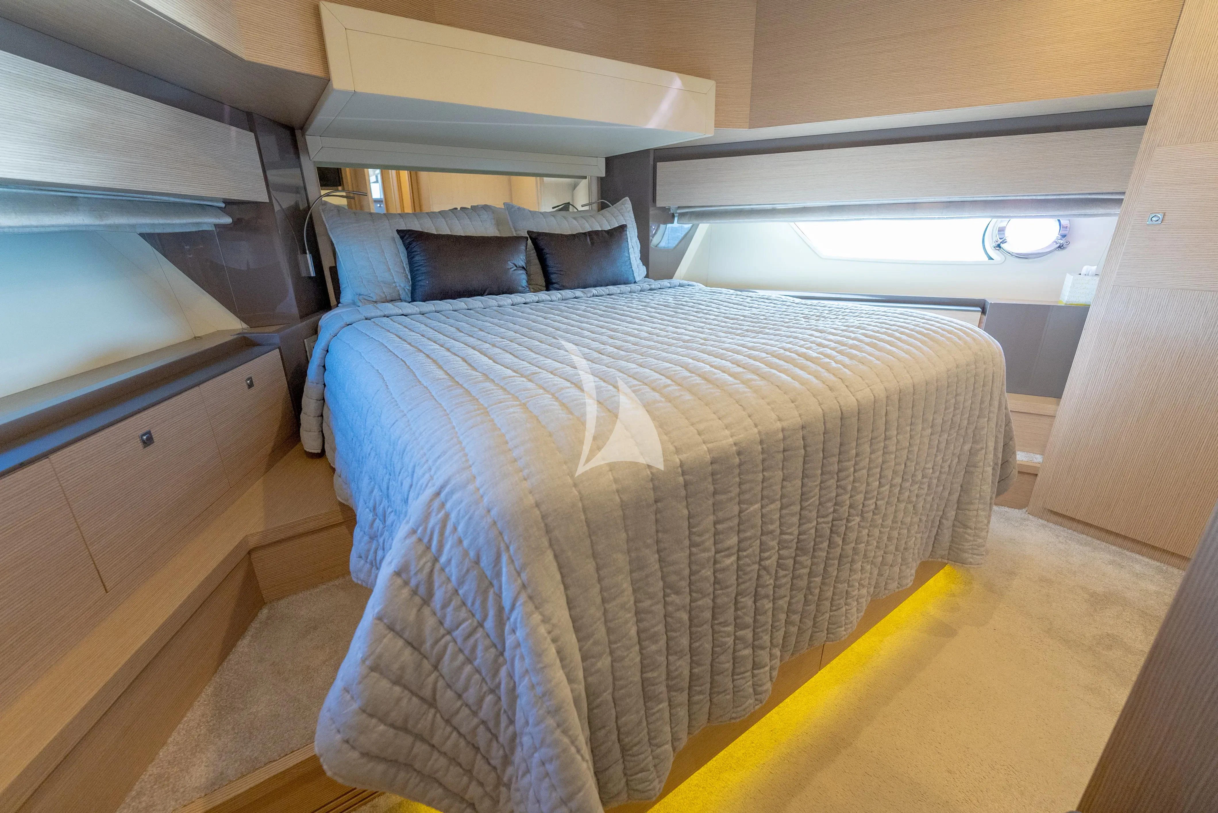 a bed in a room aboard KUDU Yacht for Sale