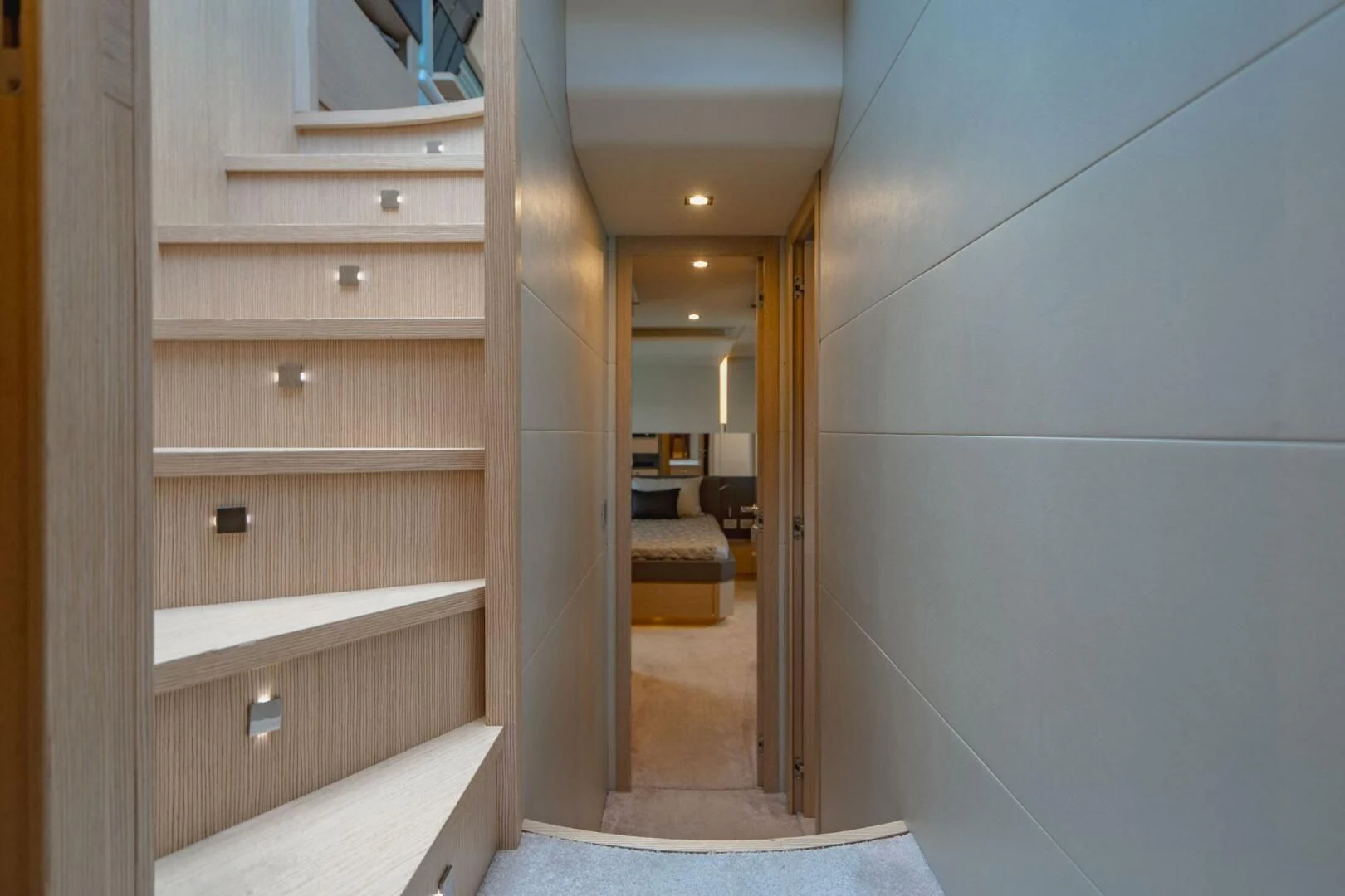 a room with a wood cabinet and a wood door aboard KUDU Yacht for Sale