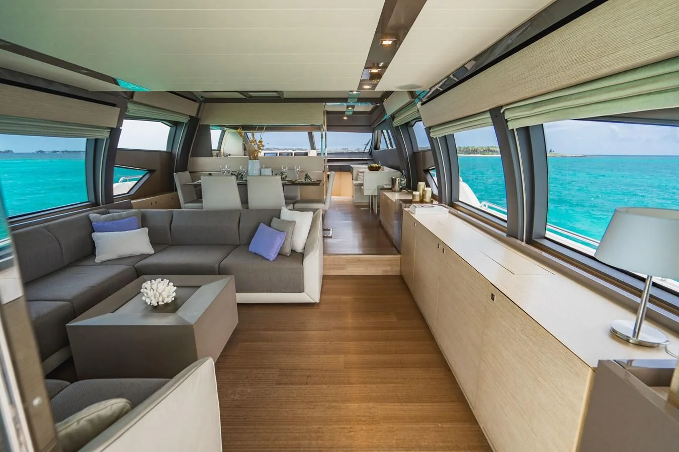 a room with a couch and a tv aboard KUDU Yacht for Sale