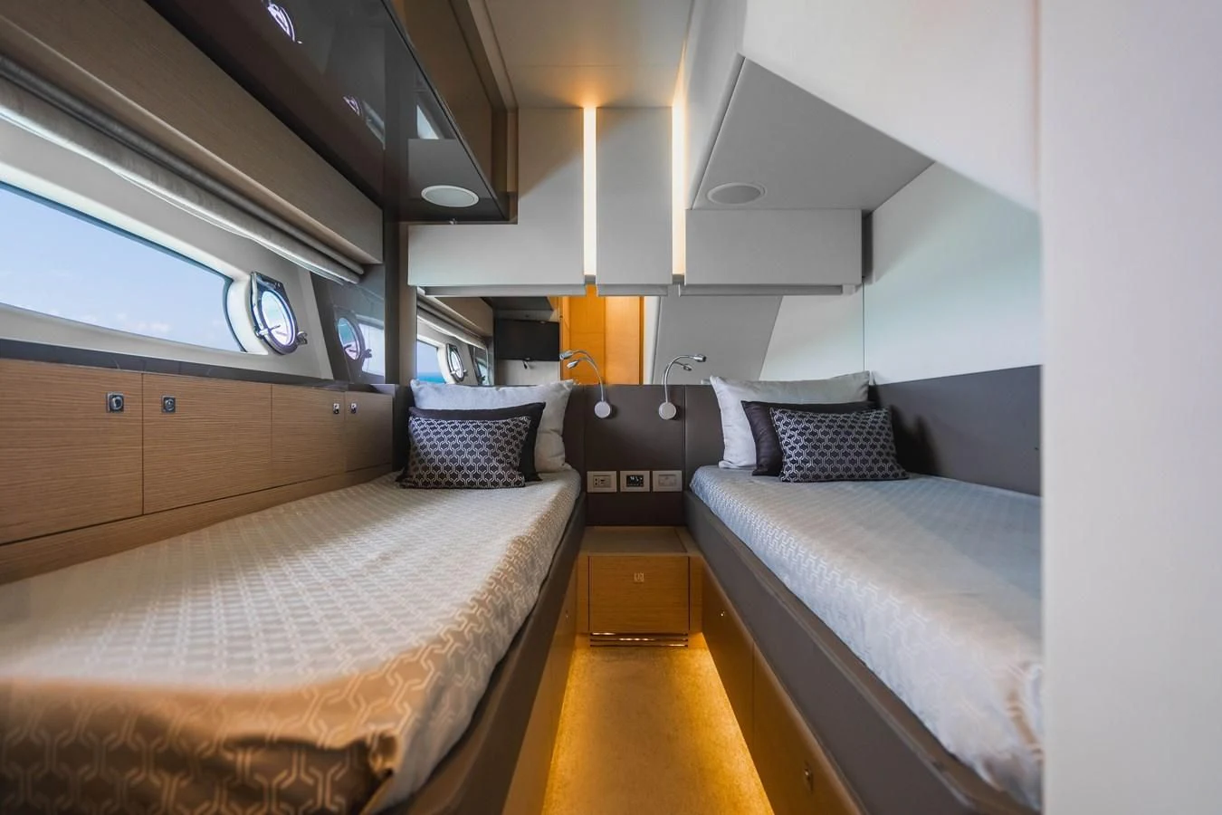 a room with two beds aboard KUDU Yacht for Sale