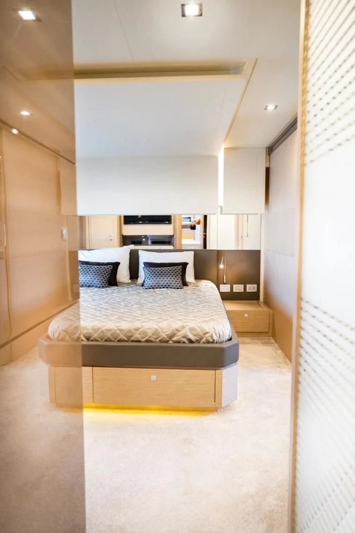 a bed in a room aboard KUDU Yacht for Sale