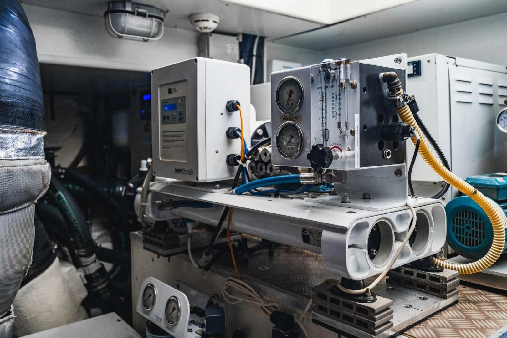 a machine with a large piece of equipment on it aboard KUDU Yacht for Sale