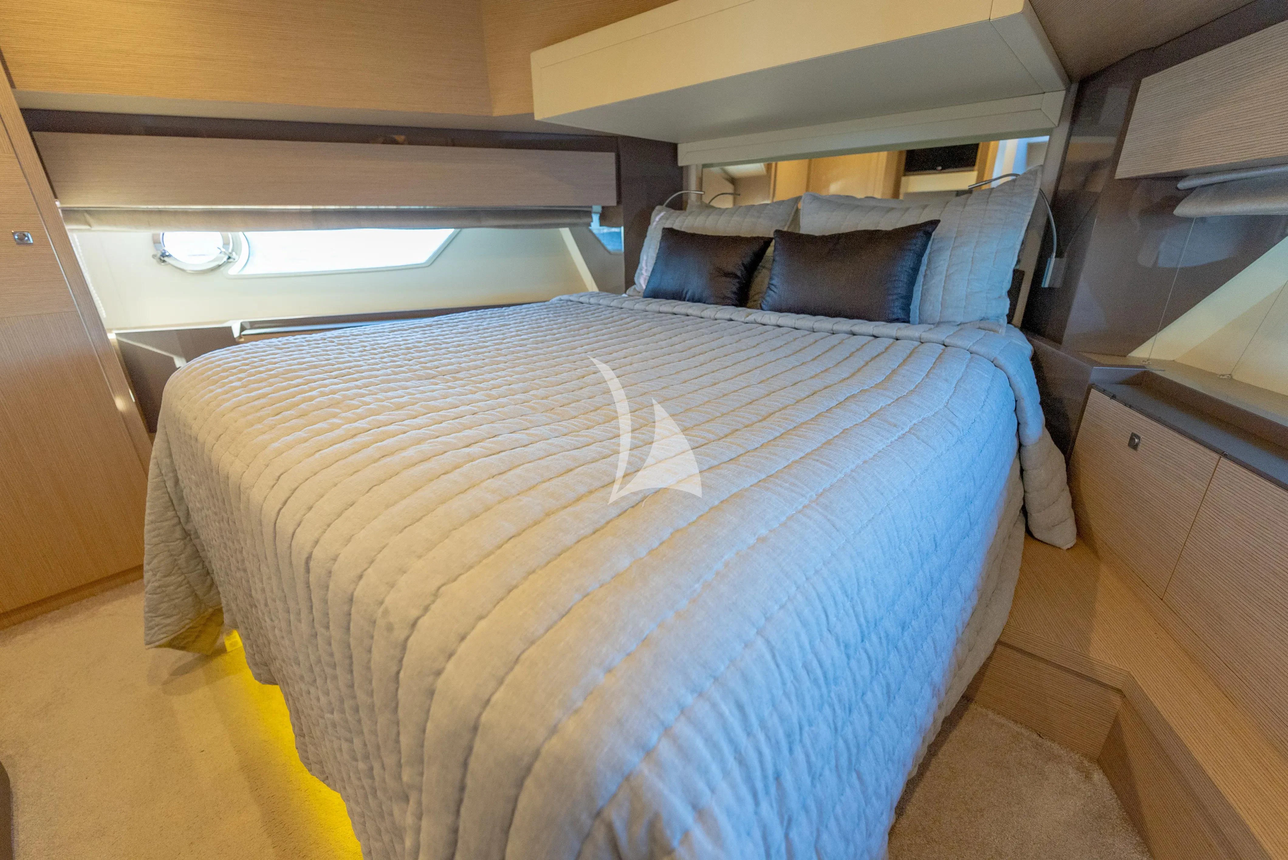 a bed in a room aboard KUDU Yacht for Sale