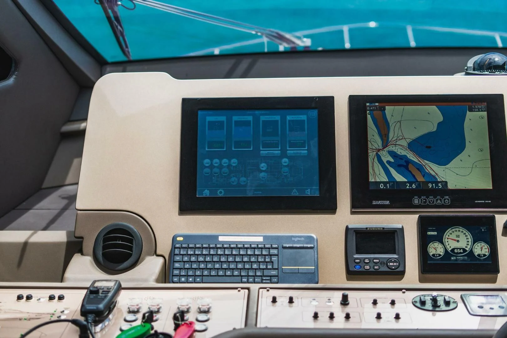 a computer with a keyboard and monitor aboard KUDU Yacht for Sale