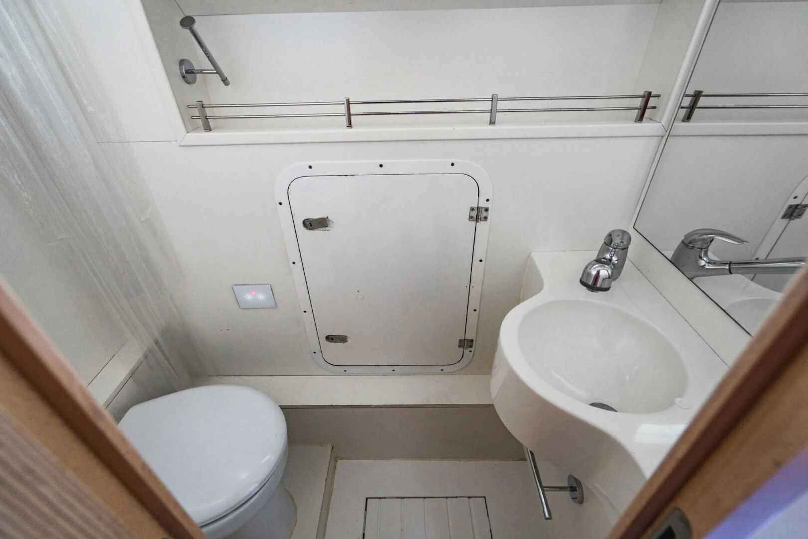 a bathroom with a sink and toilet aboard KUDU Yacht for Sale