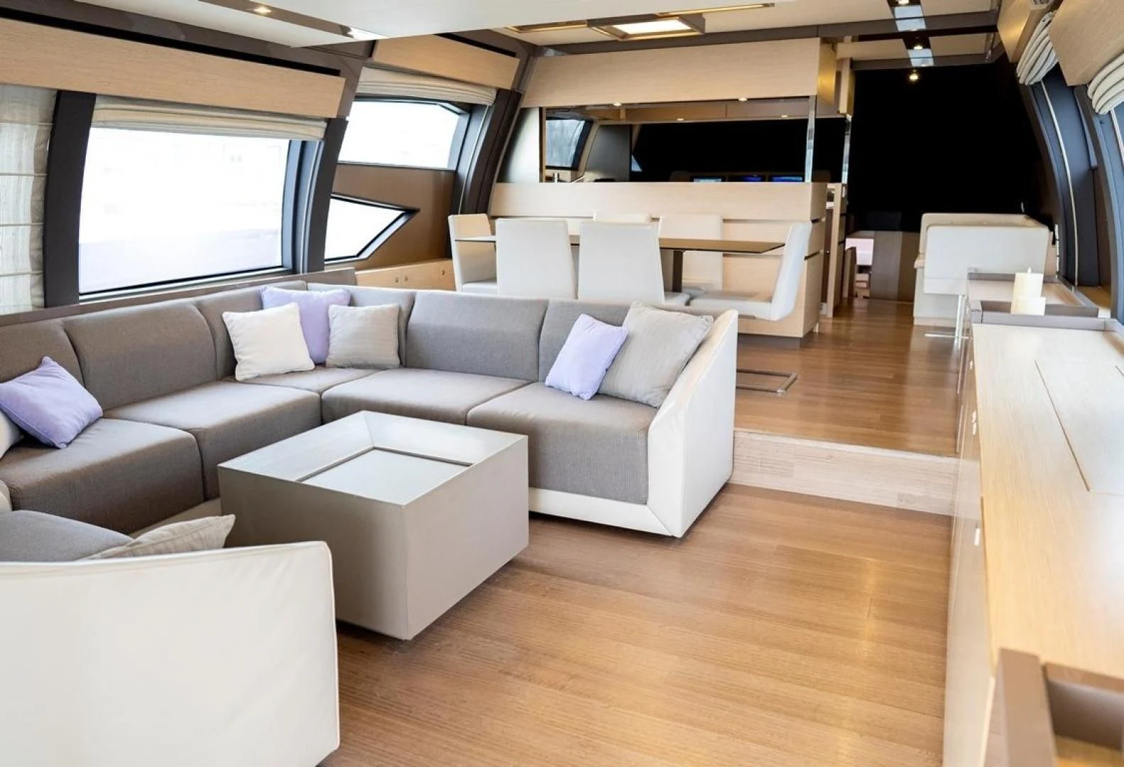 a room with a couch and a table aboard KUDU Yacht for Sale