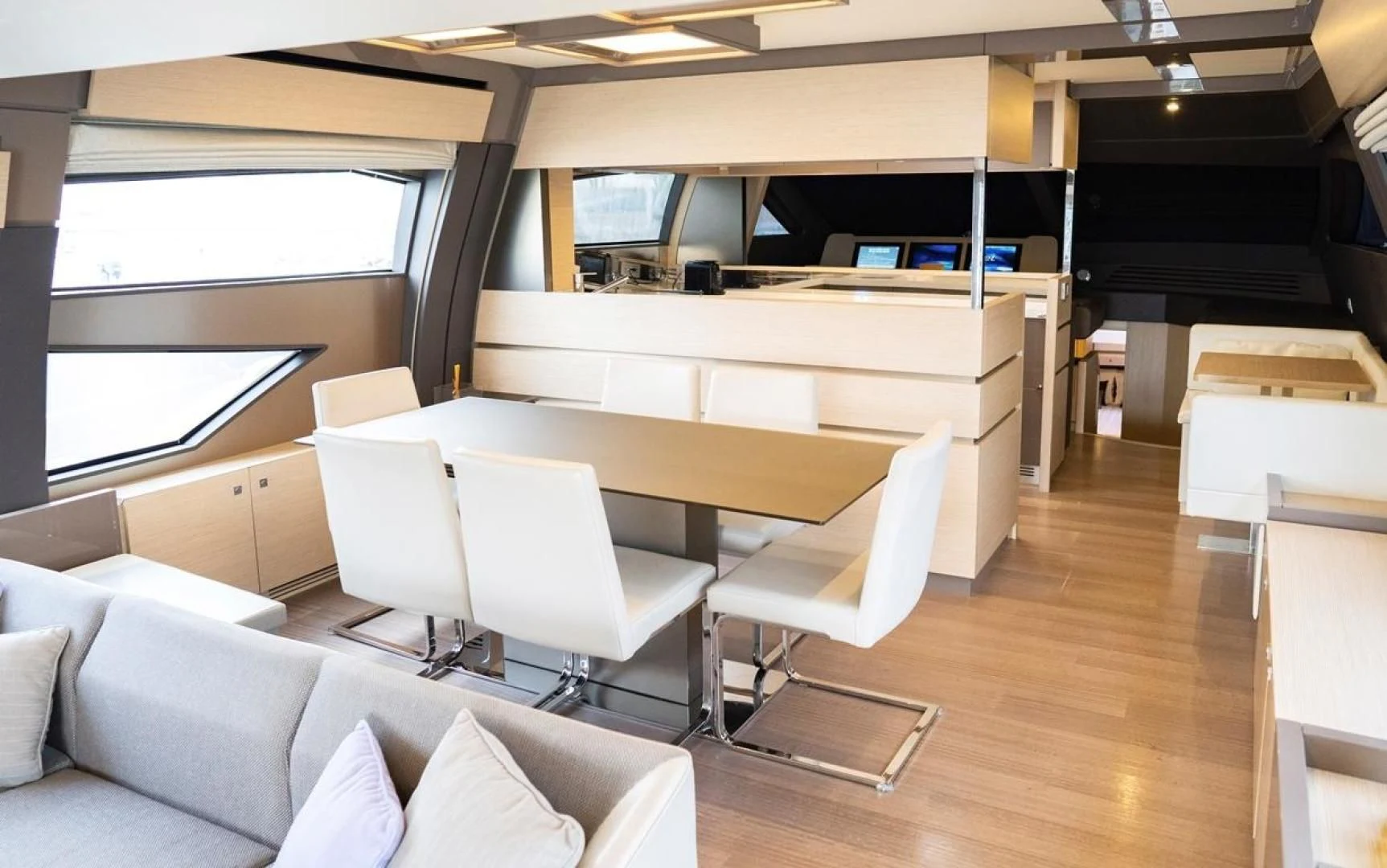 a room with a desk and chairs aboard KUDU Yacht for Sale