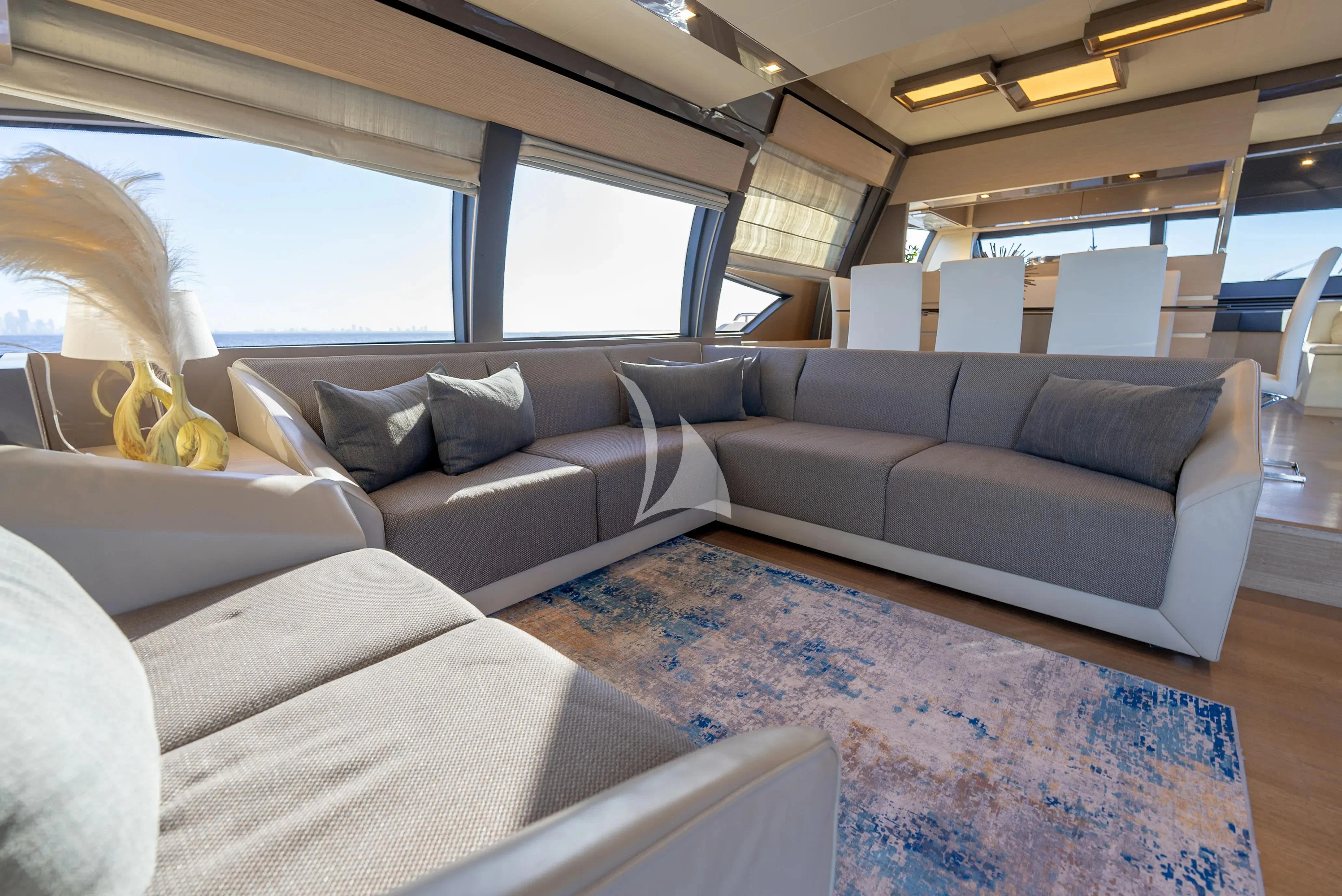 a car with a couch and a rug aboard KUDU Yacht for Sale