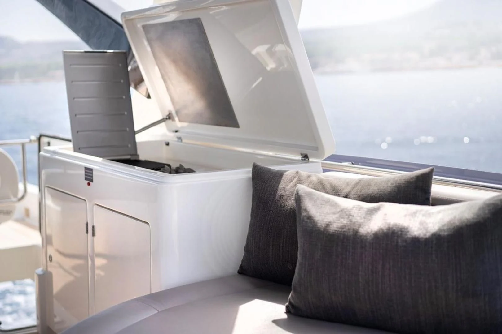 a white machine with a black screen aboard KUDU Yacht for Sale