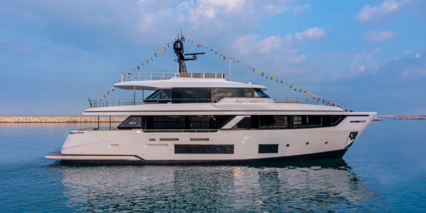 a white boat with a crane on top of it aboard WOLFPACK Yacht for Sale