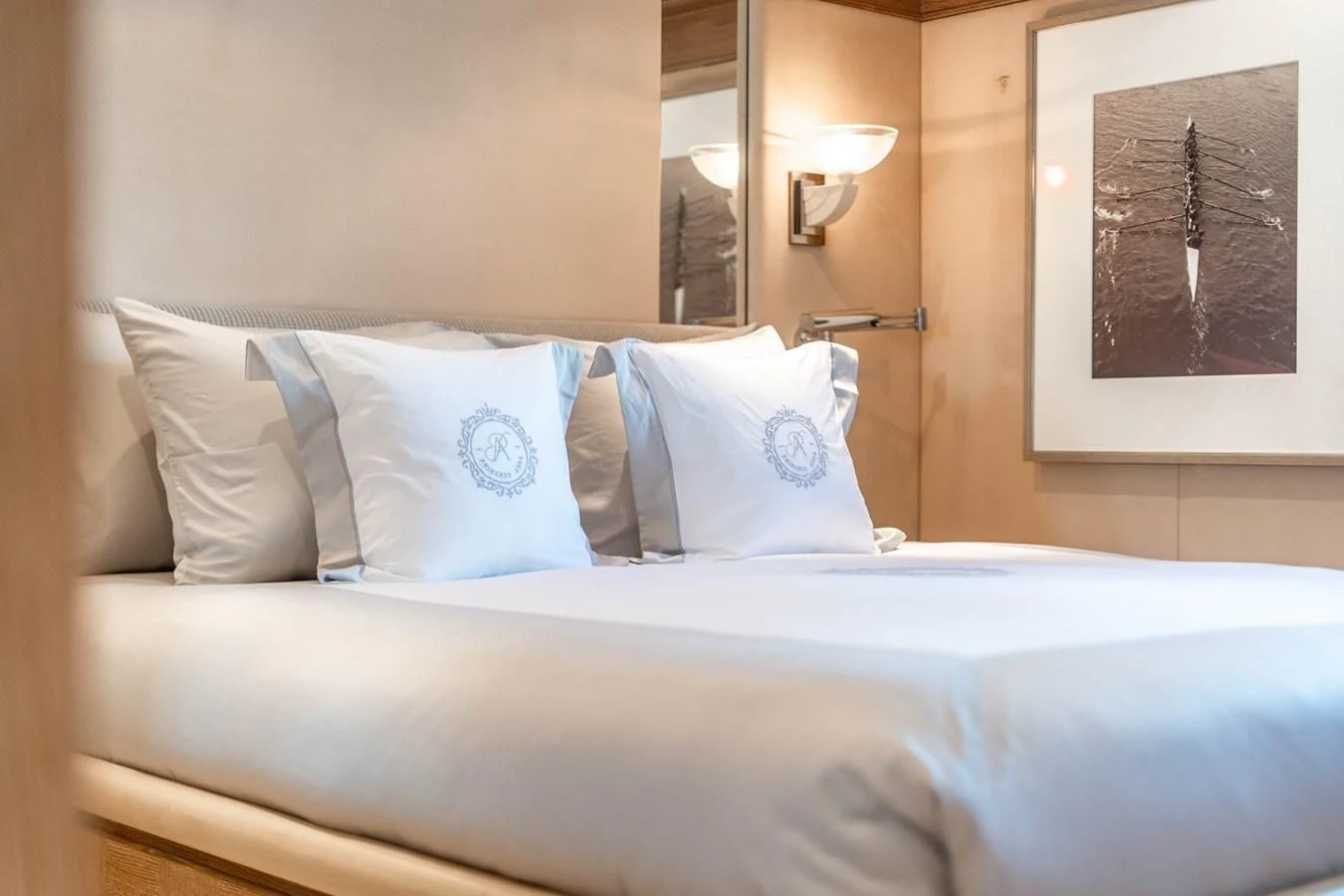 a bed with white sheets aboard ARTEMISEA Yacht for Sale