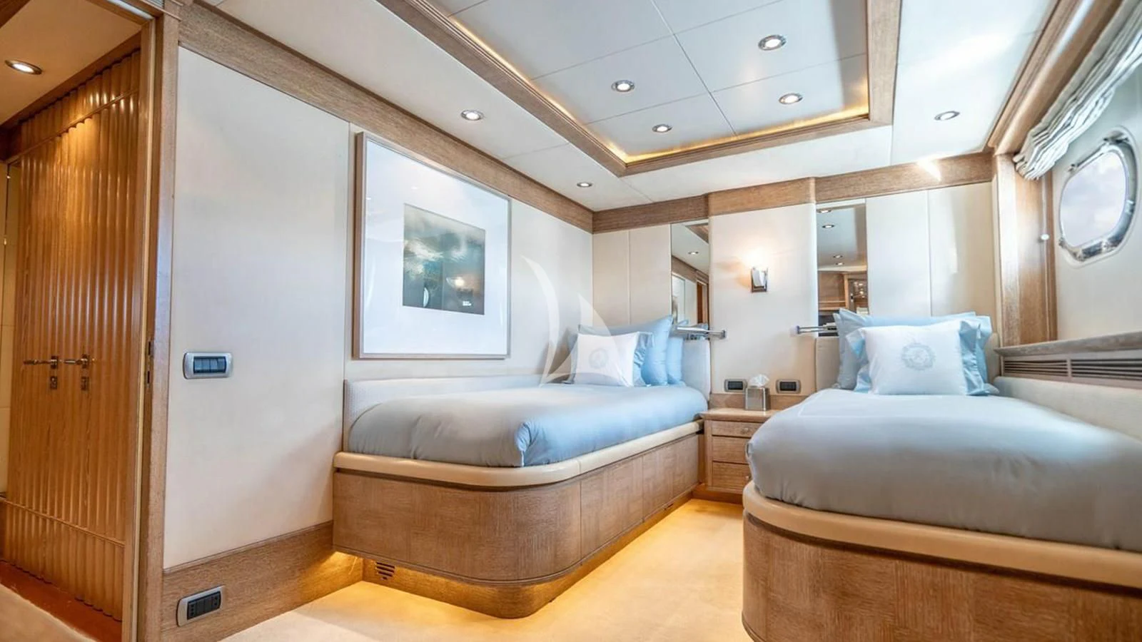 a room with two beds aboard ARTEMISEA Yacht for Sale