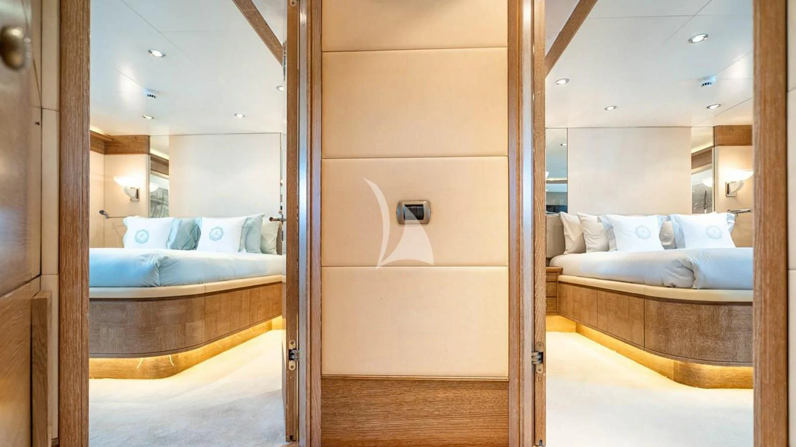 a room with a bed and a mirror aboard ARTEMISEA Yacht for Sale