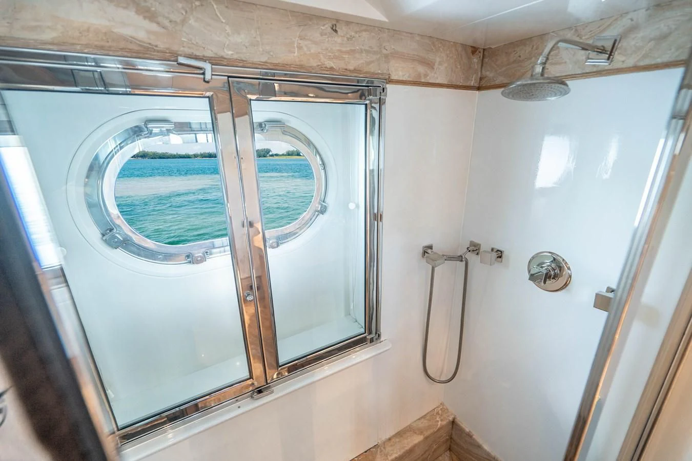 a bathroom with a shower and a sink aboard ARTEMISEA Yacht for Sale