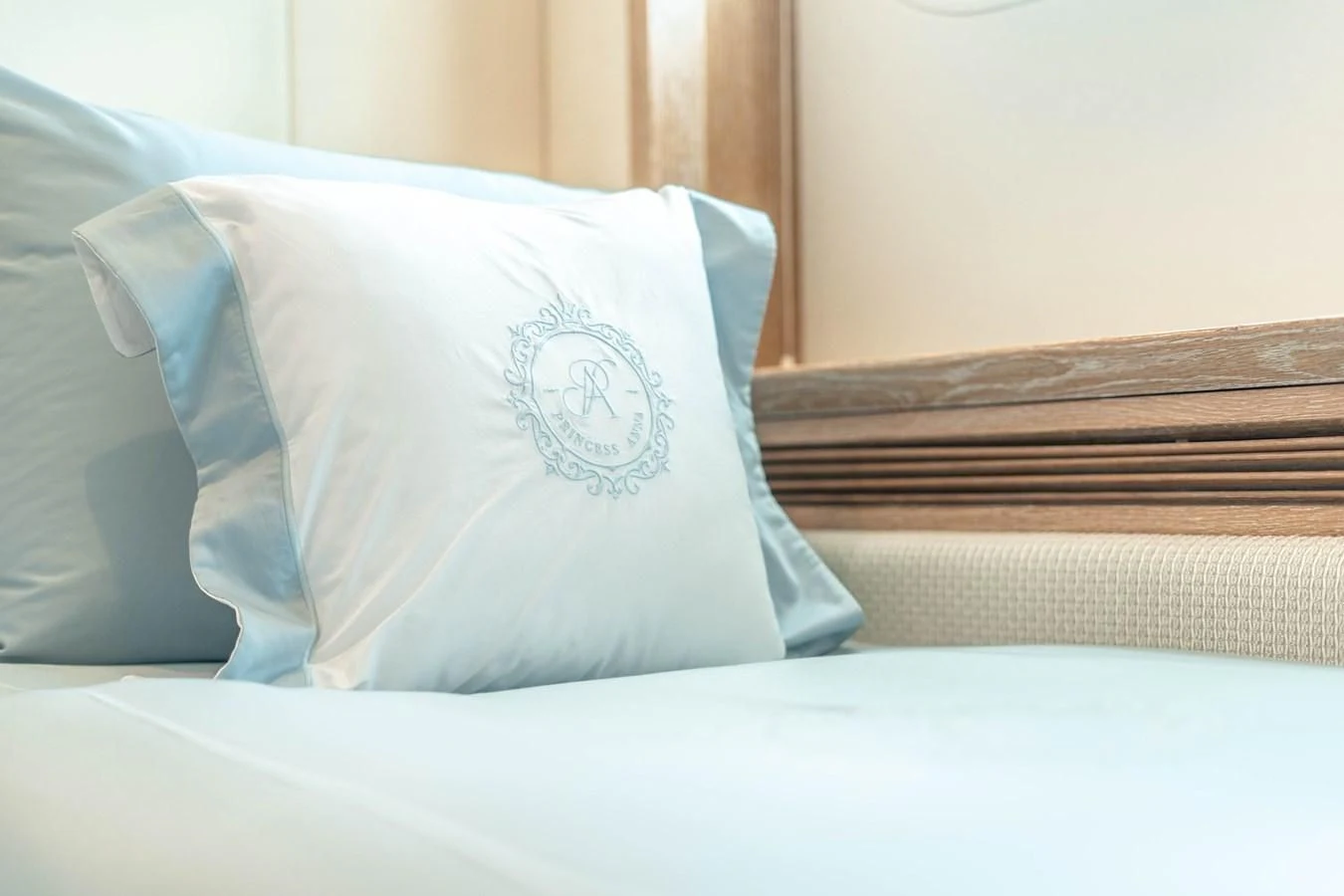a pillow on a bed aboard ARTEMISEA Yacht for Sale