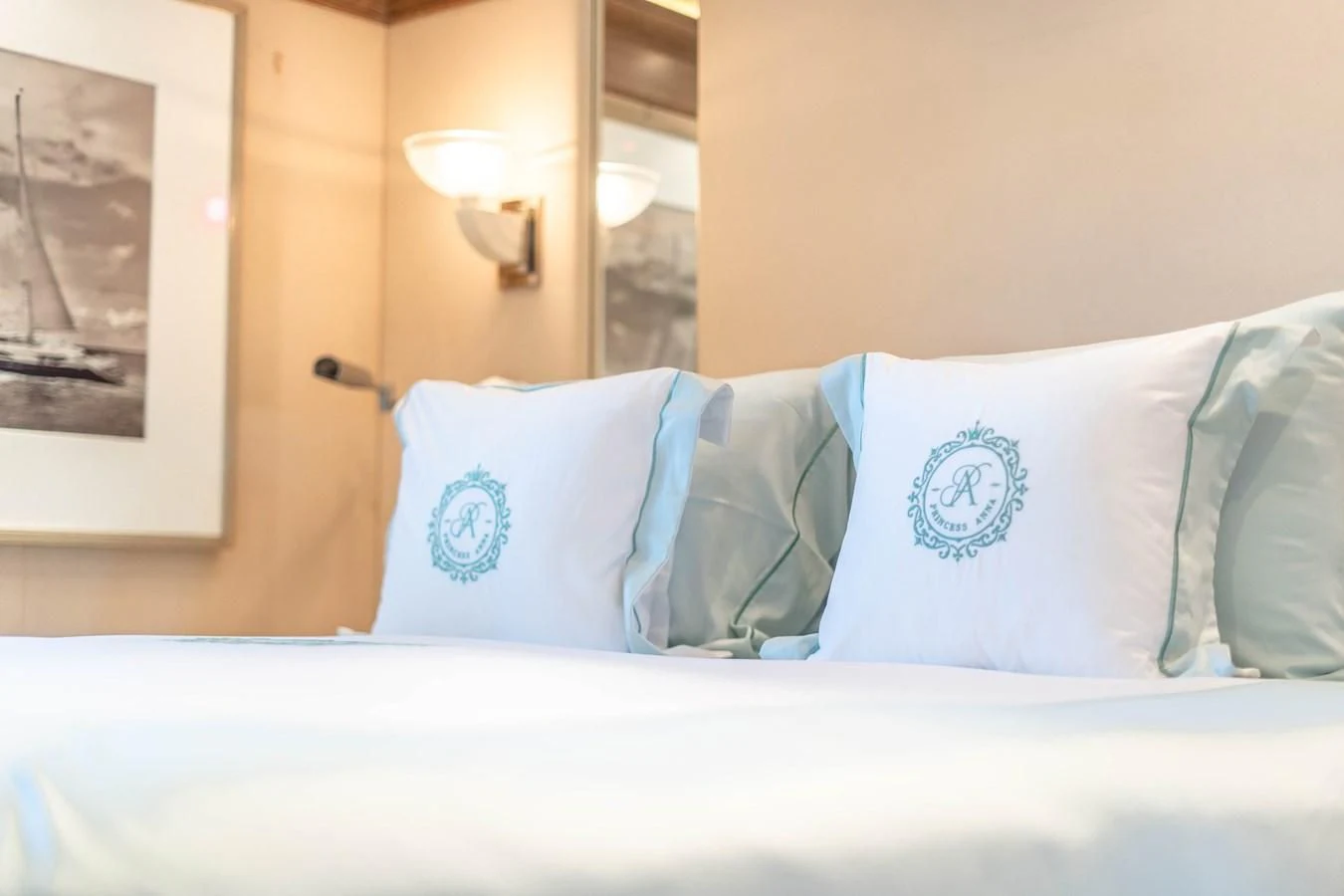 a bed with pillows aboard ARTEMISEA Yacht for Sale