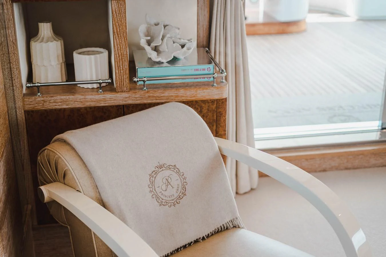 a chair in front of a window aboard ARTEMISEA Yacht for Sale