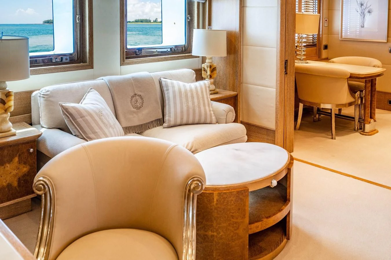 a living room with a couch and a chair aboard ARTEMISEA Yacht for Sale