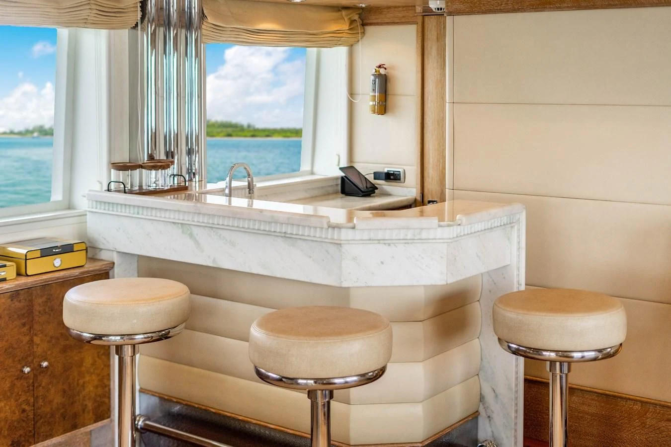 a bathroom with a tub and stool aboard ARTEMISEA Yacht for Sale