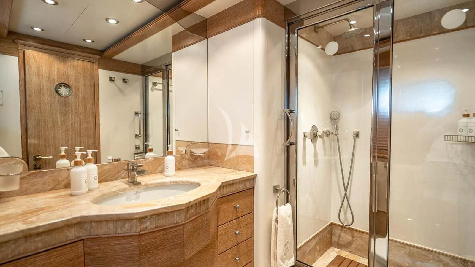 a bathroom with a large mirror aboard ARTEMISEA Yacht for Sale