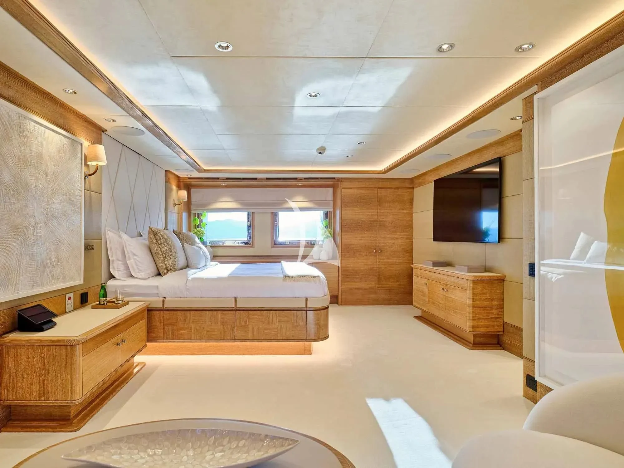a room with a bed and a tv aboard ARTEMISEA Yacht for Sale