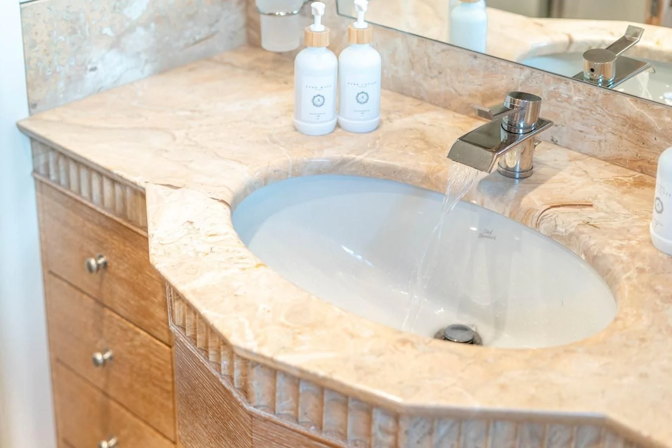 a bathroom sink with a faucet aboard ARTEMISEA Yacht for Sale