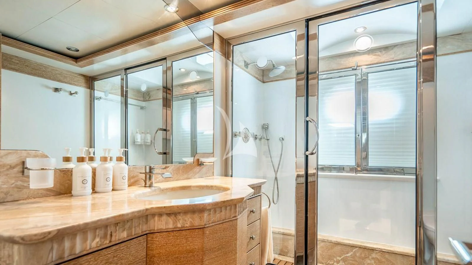 a bathroom with a large mirror aboard ARTEMISEA Yacht for Sale