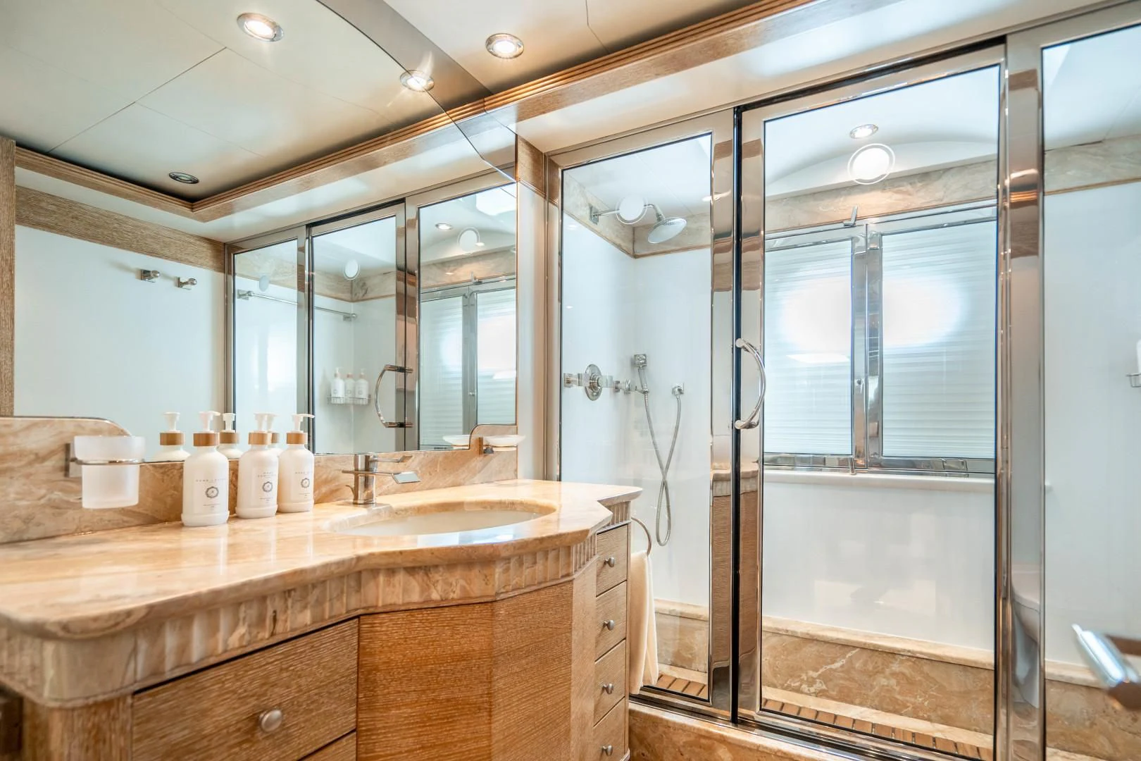 a bathroom with a large mirror aboard ARTEMISEA Yacht for Sale