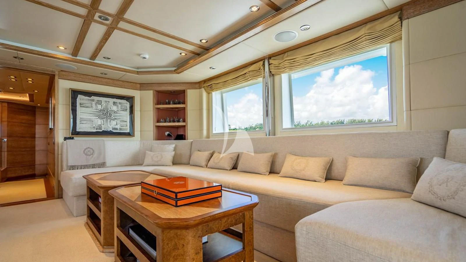 a living room with a couch and a table aboard ARTEMISEA Yacht for Sale